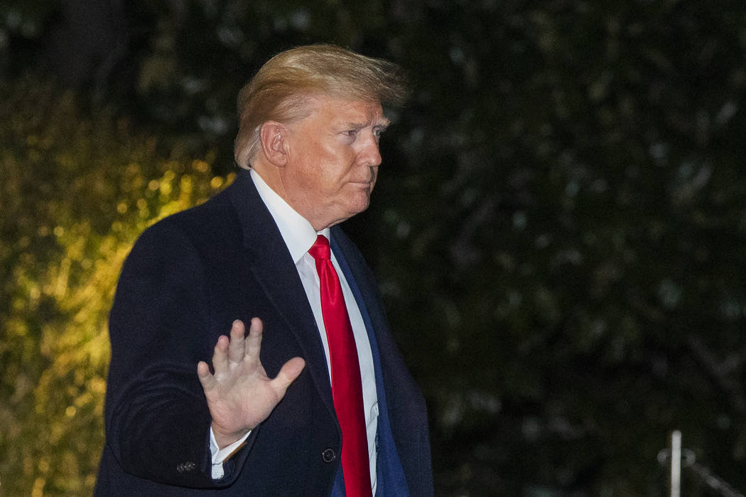 President Donald Trump waves as he leaves the White House, Monday, Jan. 20, 2020, in Washington ...