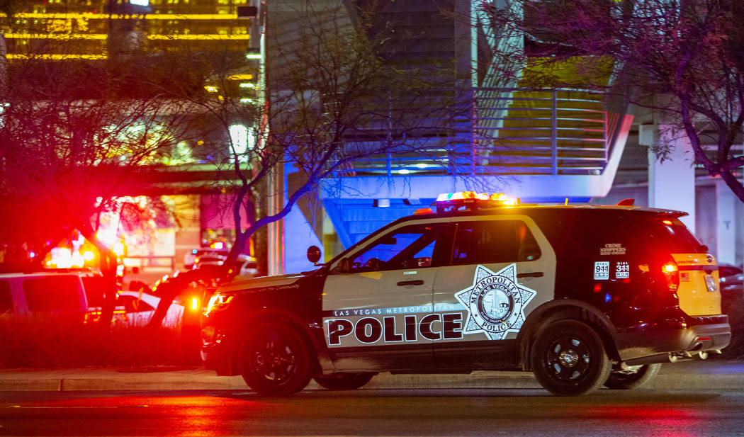 A Metropolitan Police Department officer man's a Fashion Show Mall garage entrance near Dillard ...