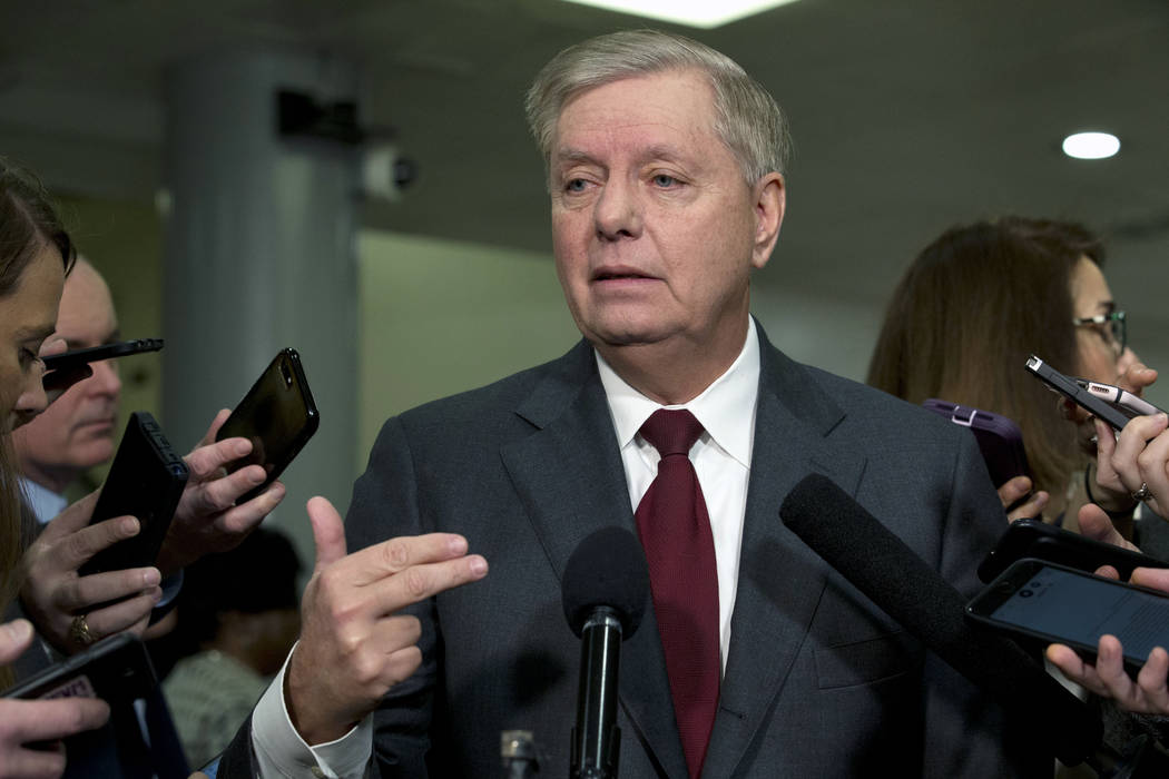 Sen. Lindsey Graham, R-S.C., speaks to the media before attending the impeachment trial of Pres ...