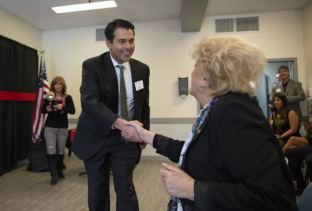 In a Nov. 1, 2018, file photo, Nevada Assistant Attorney General Brin Gibson shakes the hand of ...