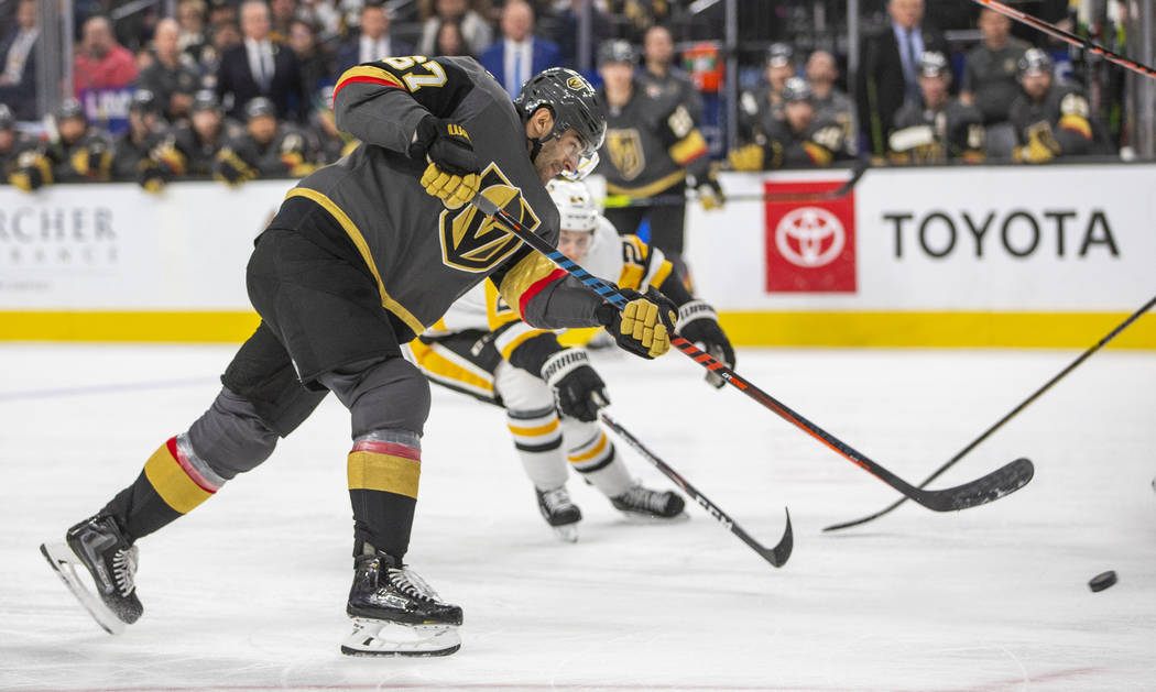 Vegas Golden Knights' Max Pacioretty (67) shoots against the Pittsburgh Penguins during the sec ...