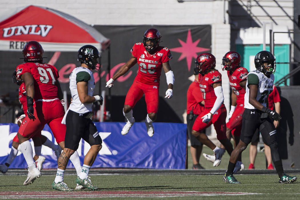 UNLV Rebels linebacker Gabe McCoy (25) celebrates a turnover in the first quarter during their ...