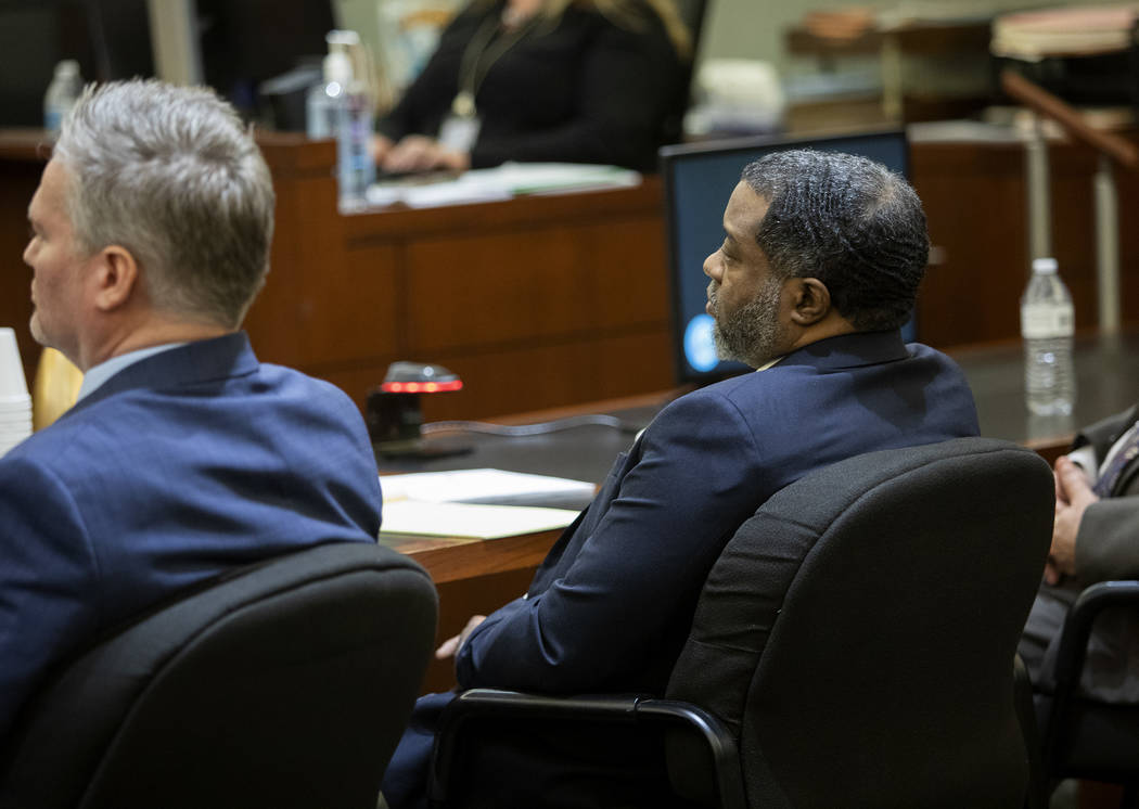 Charles Talley Jr., right, sits next to his defense attorney Michael Hyte, left, during his tri ...