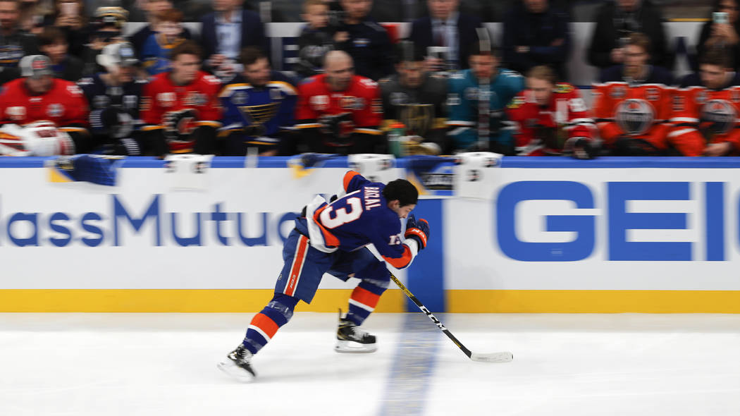 New York Islanders Matthew Barzal skates during the Skills Competition fastest skater contest, ...