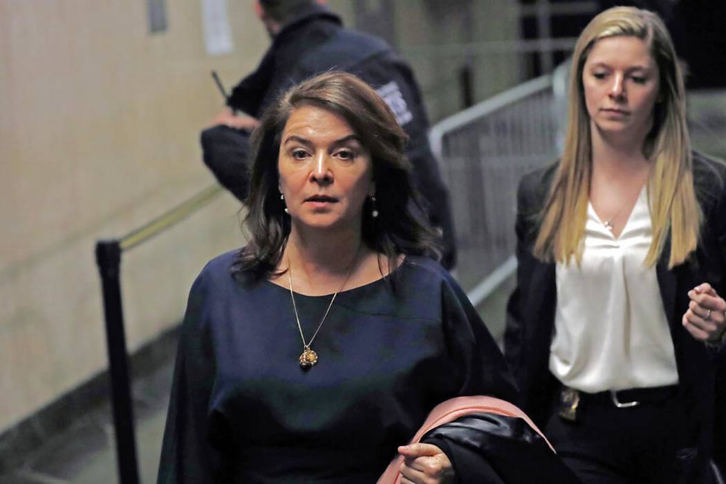 Actress Annabella Sciorra, left, leaves Manhattan Criminal Court after appearing at Harvey Wein ...
