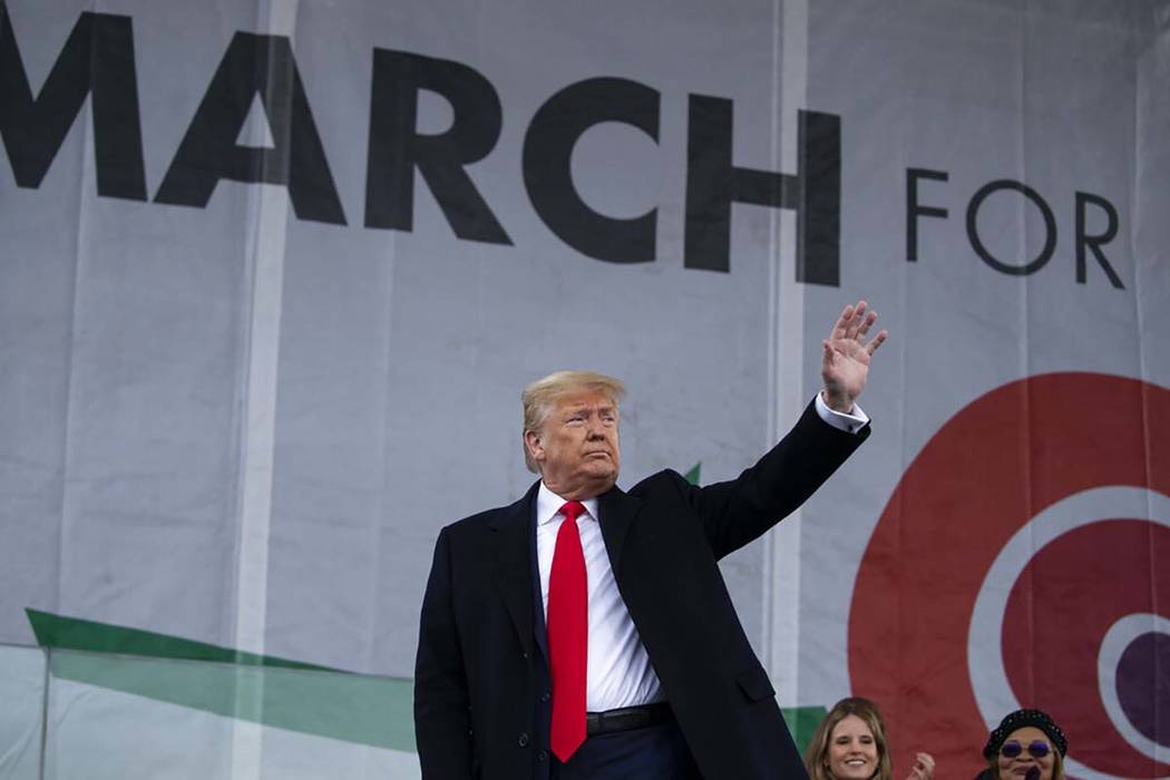 President Donald Trump waves after speaking during the annual "March for Life" rally ...