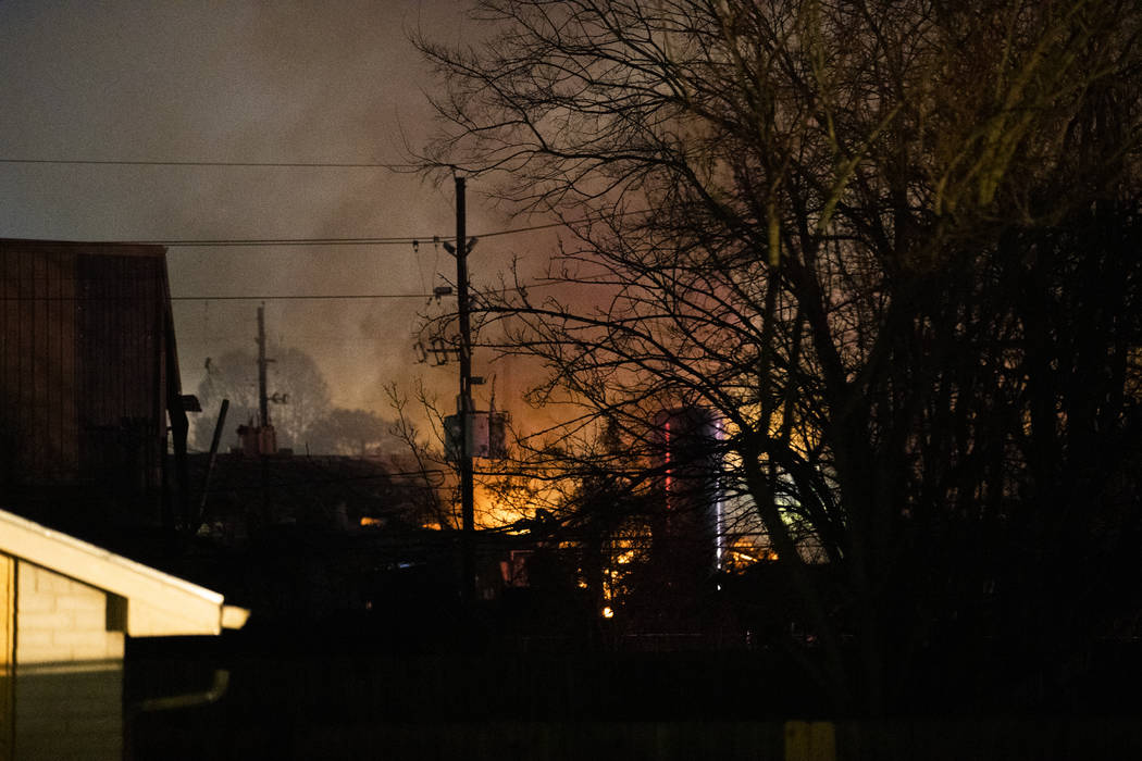Flames fill the sky after a massive explosion rocks west Houston Friday, Jan. 24, 2020, in Hous ...