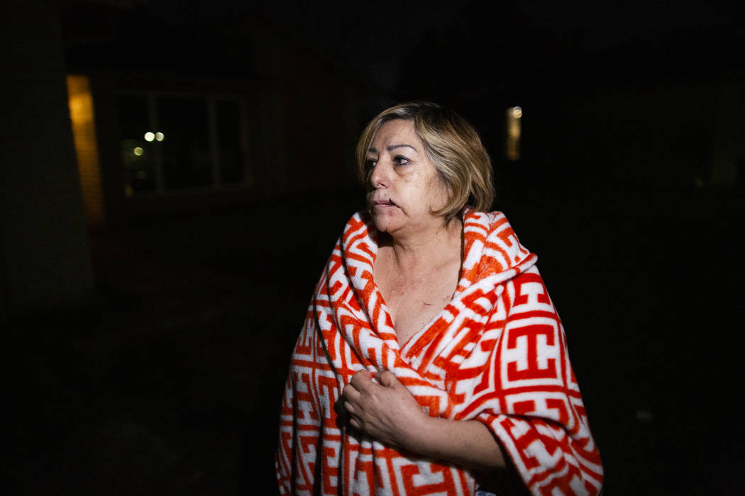 Maria Olivo, a west Houston resident, is shown after a massive explosion blew the window in the ...