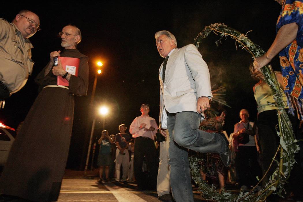 Martin Sheen walks onto the test site moments before being arrested during a protest on Aug. 6, ...