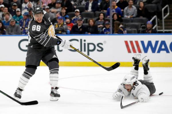 Boston Bruins forward David Pastrnak (88) scores a goal past Pittsburgh Penguins defender Kris ...