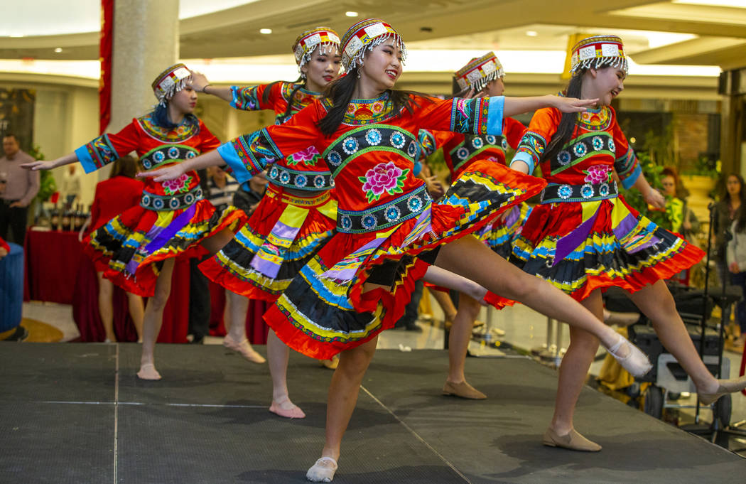 Members of the Shirley Chen Dance Troupe perform at a reception as the Grand Canal Shoppes cele ...