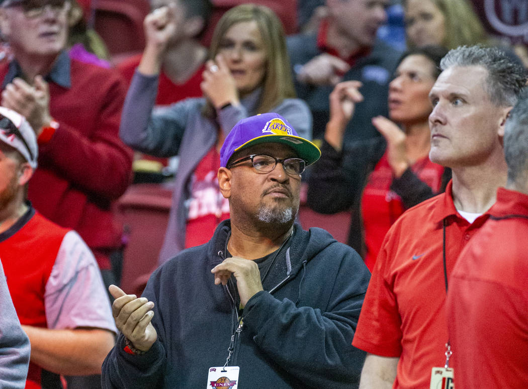 A UNLV Rebels fan wears a Lakers' hat as they take on the San Diego State Aztecs during the sec ...
