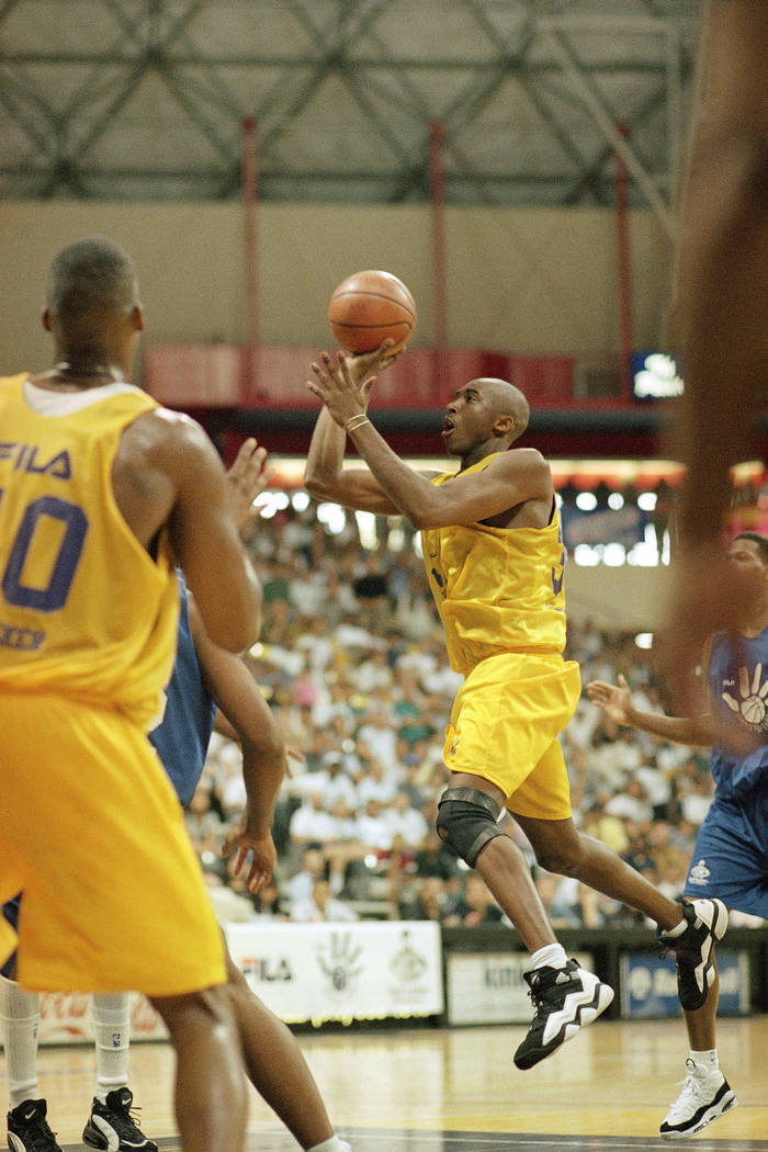 Los Angeles Laker Kobe Bryant drives the open lane during a summer league game against the Detr ...