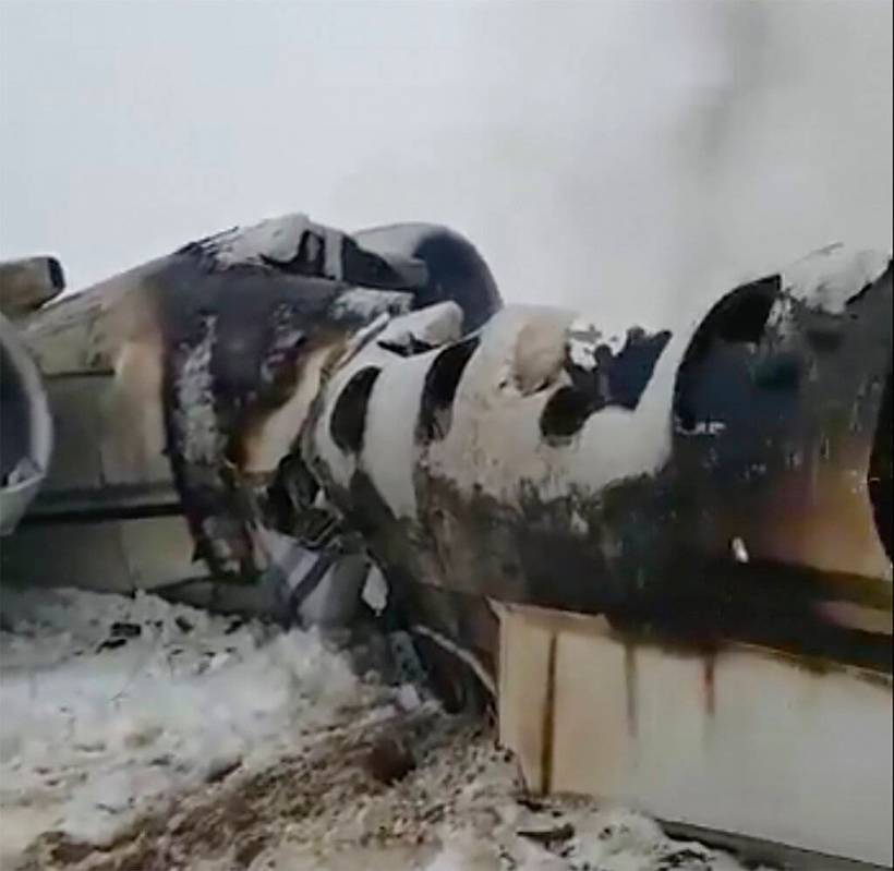 This photo provided by Tariq Ghazniwal shows an aircraft that crashed in eastern Afghanistan on ...