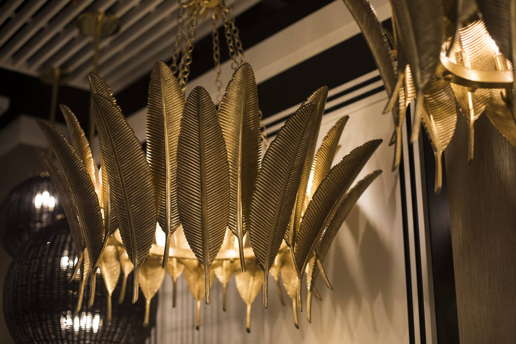 An example of feathers motif, a trend for the coming year, at the Corbett Lighting booth at the ...