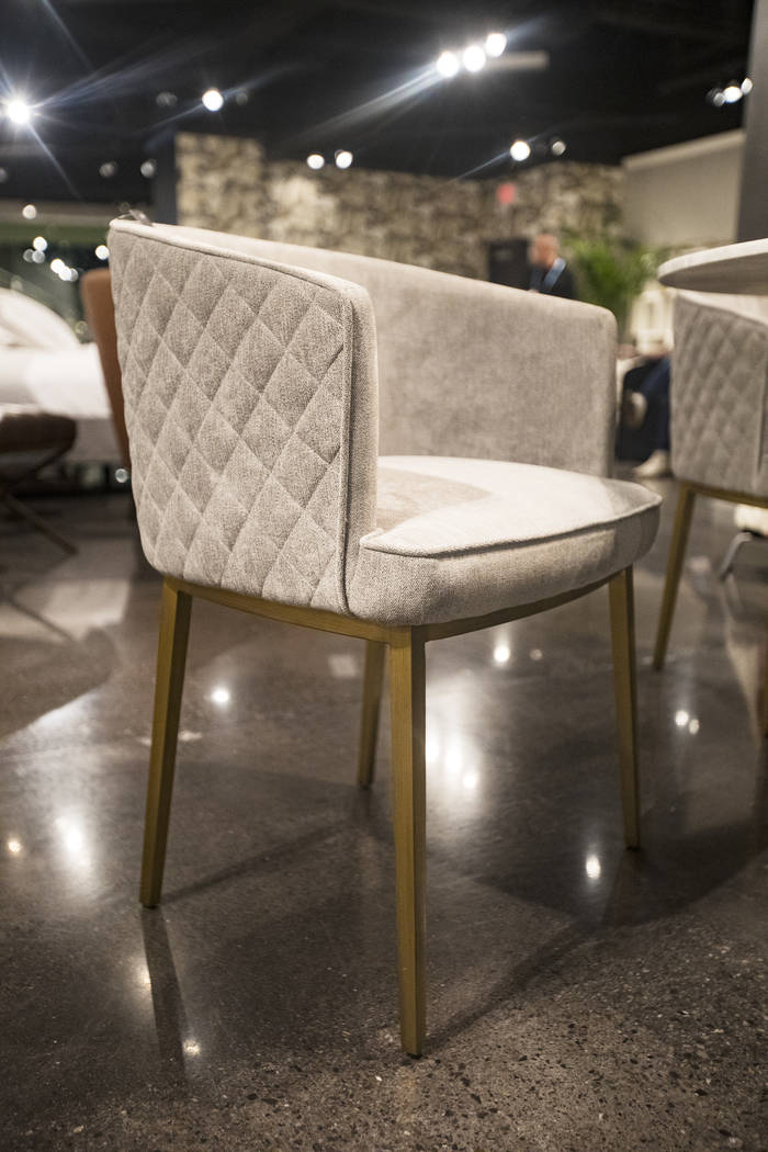 The chairÕs neutral textures shows a trend for the coming year at the Sunpan booth at the ...