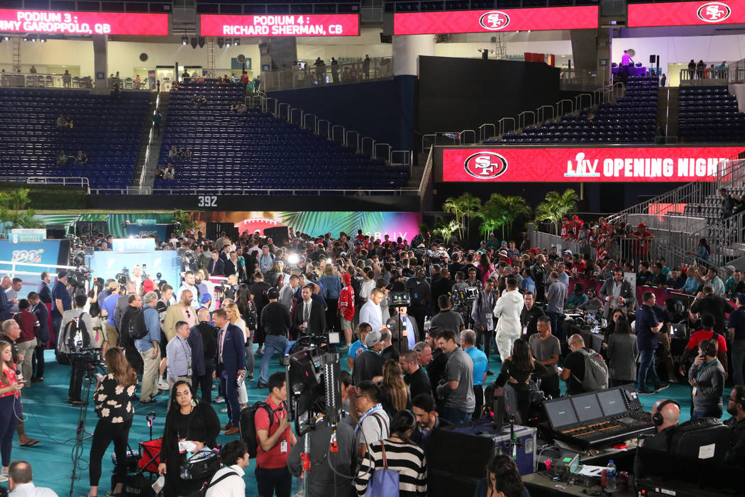 Fans and media attend Super Bowl LIV Opening Night in Marlins Park in Miami, Fla., Monday, Jan. ...