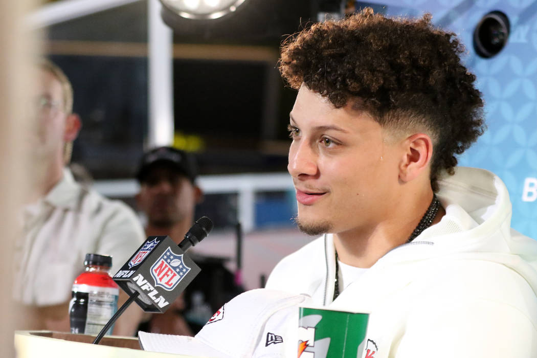 Kansas City Chiefs quarterback Patrick Mahomes takes questions during Super Bowl LIV Opening Ni ...