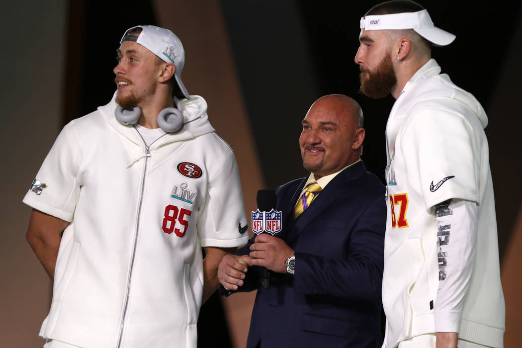 San Francisco 49ers tight end George Kittle, left, and Kansas City Chiefs tight end Travis Kelc ...