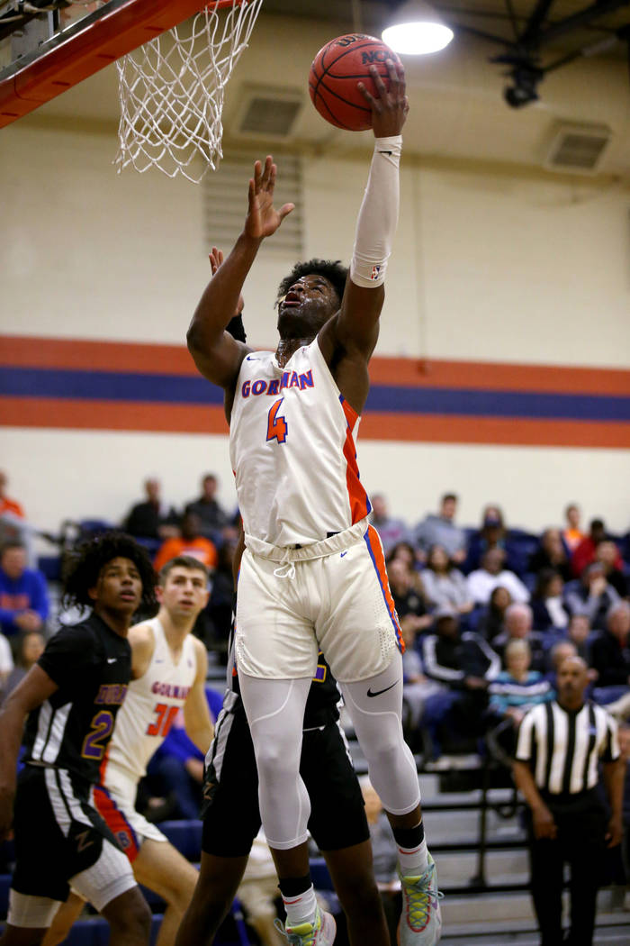 Bishop Gorman guard Jonathan Braggs (4) shoots in the first quarter of a basketball game agains ...