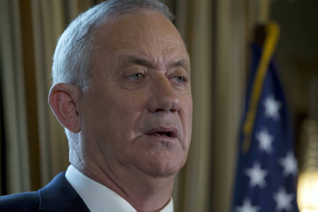 Israel Blue and White party leader Benny Gantz speaks during a news conference in Washington, M ...