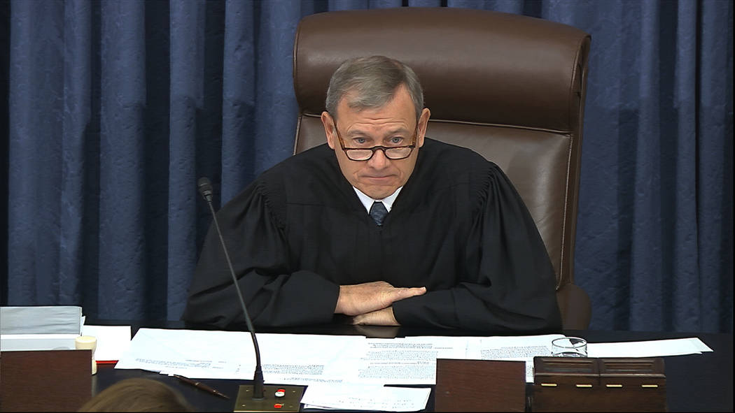 Presiding officer Chief Justice of the United States John Roberts speaks during the impeachment ...