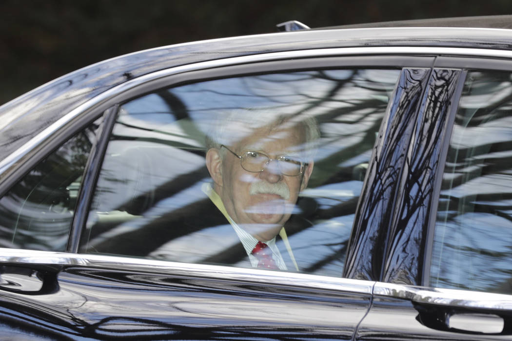 Former National security adviser John Bolton leaves his home in Bethesda, Md. Tuesday, Jan. 28, ...