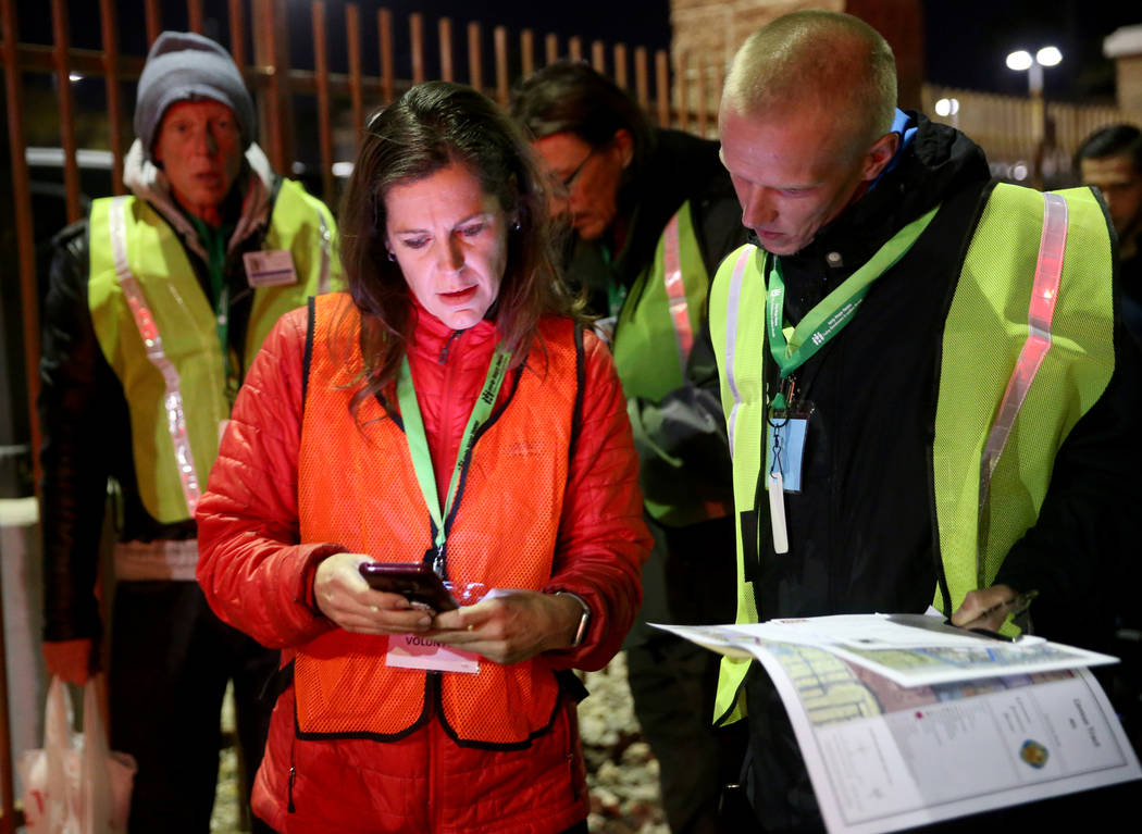 SafeNest CEO Liz Ortenburger uses an app to survey and count the homeless population with volun ...