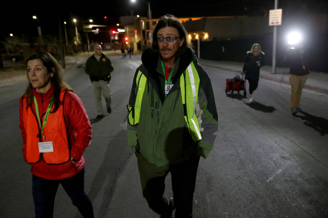 SafeNest CEO Liz Ortenburger and homeless count volunteer Mark Chadwick on Foremaster Lane in d ...