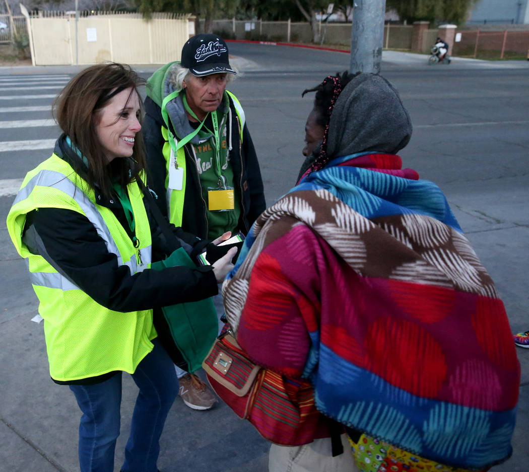 Homeless count volunteers Clark County Social Services grant administrator Shawna Thompson and ...