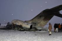 A wreckage of a U.S. military aircraft that crashed in Ghazni province, Afghanistan, is seen Mo ...