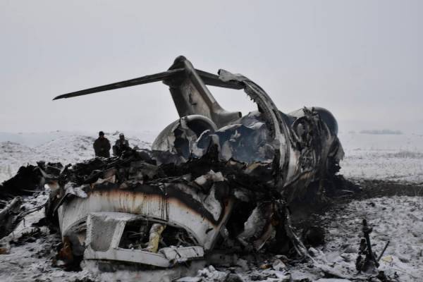 A wreckage of a U.S. military aircraft that crashed in Ghazni province, Afghanistan, is seen Mo ...