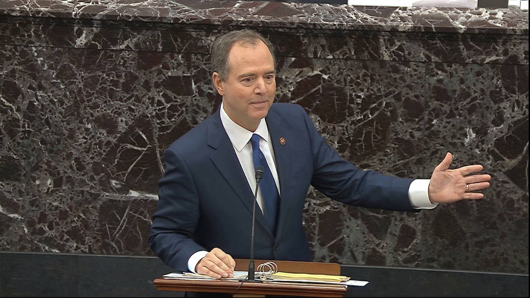 In this image from video, House impeachment manager Rep. Adam Schiff, D-Calif., answers a quest ...