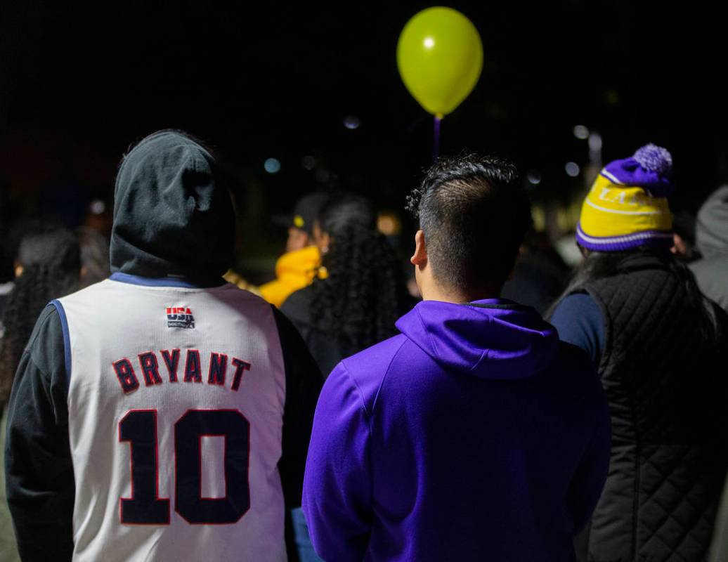 Attendees listen to stories about the impact Kobe Bryant had on his fans lives during a vigil f ...