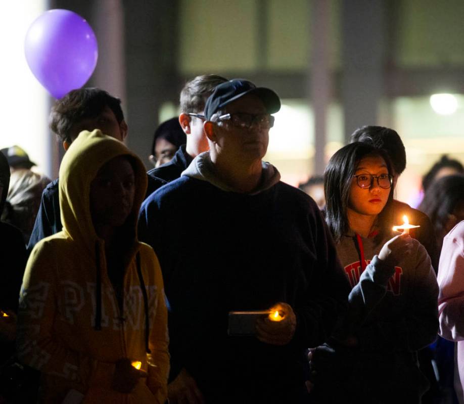 Attendees listen to stories about the impact Kobe Bryant had on his fans lives during a vigil f ...