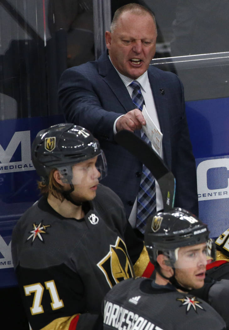 Vegas Golden Knights head coach Gerard Gallant talks to his players during the second period of ...