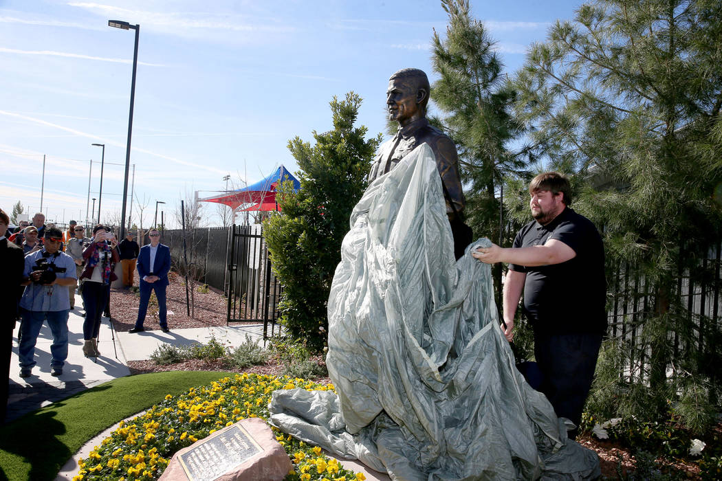 The Alyn Beck statue designed by sculptor Brian Hanlon, is unveiled during the grand opening ev ...