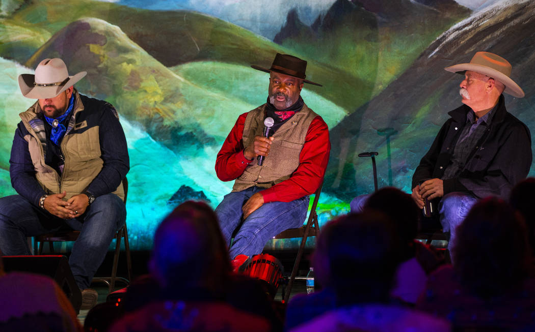 Pete Taylor, of Oakland, Calif., center, speaks during a panel about horsemanship during the 36 ...