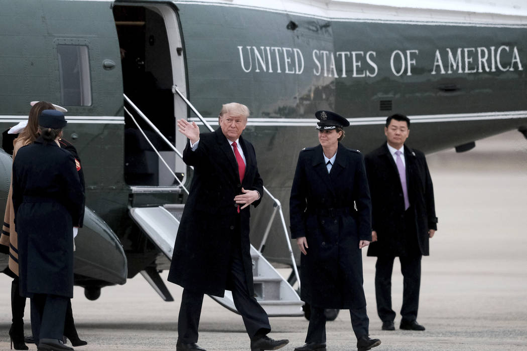 President Donald Trump arrives to board Air Force One at Andrews Air Force Base in Md., Friday, ...