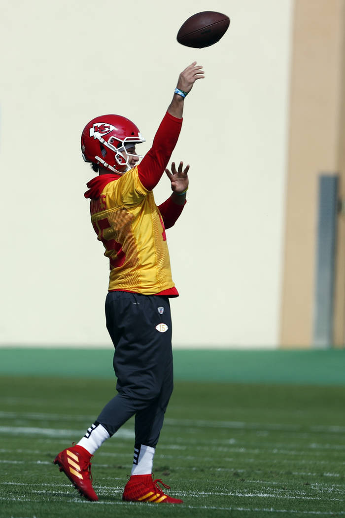 Kansas City Chiefs quarterback Patrick Mahomes (15) throws during practice on Friday, Jan. 31, ...