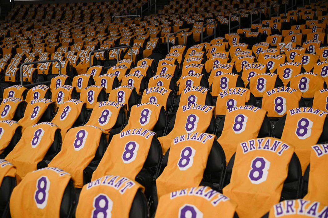 The Los Angeles Lakers honor the late Kobe Bryant by laying out T-shirts for fans prior to the ...