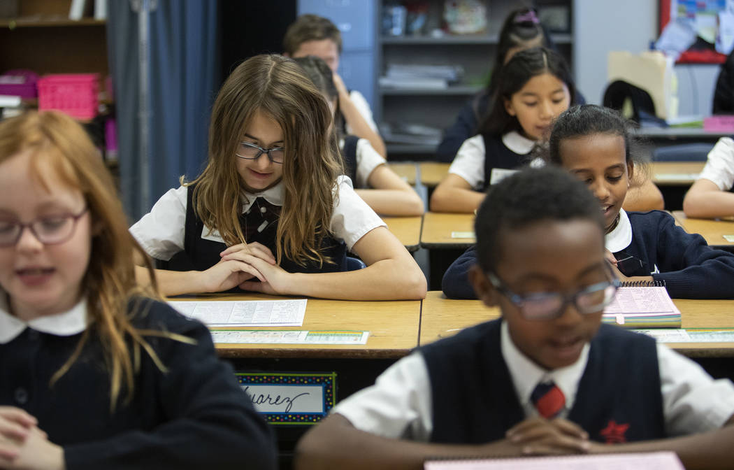 A fifth grade classroom reads aloud at American Preparatory Academy on Thursday, Feb. 13, 2020, ...