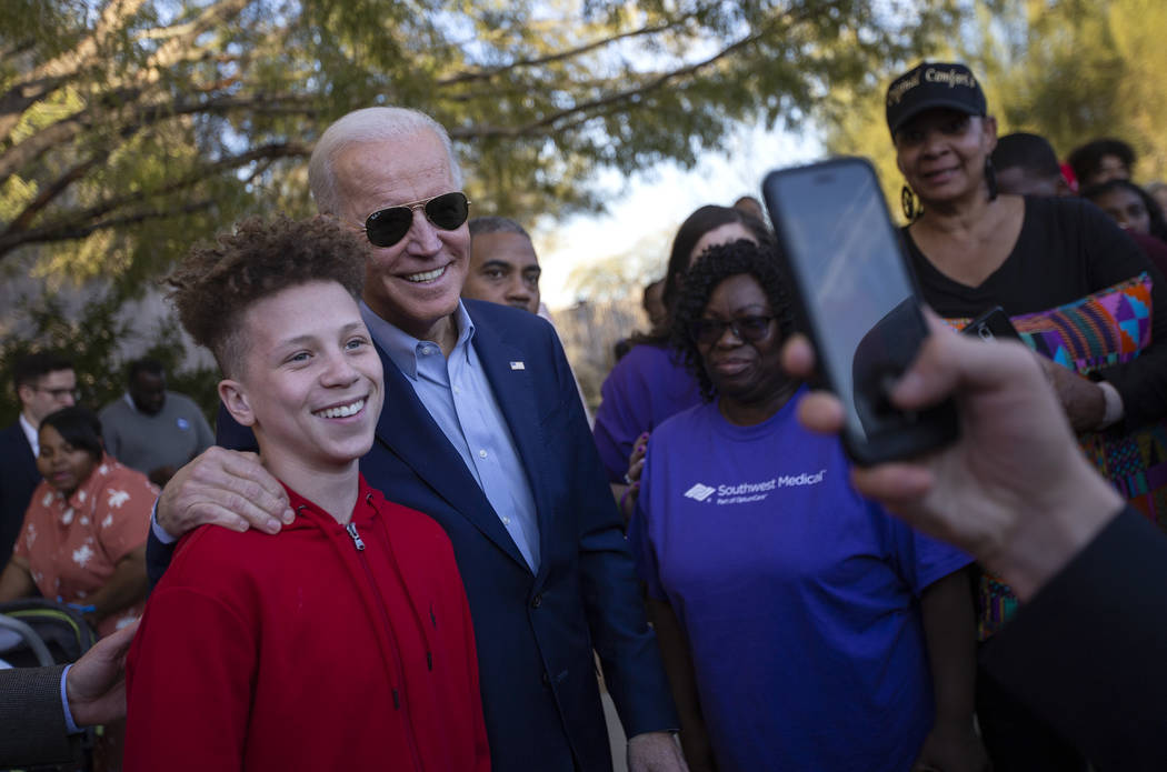 Levi Snyder, 15, of Las Vegas, poses for a photo with former Vice President and presidential ca ...