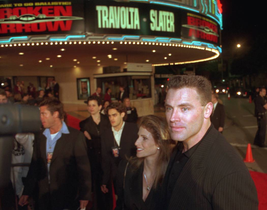 Howie Long and his wife Diane arrive at the premiere of "Broken Arrow", Monday night, Feb. 5, 1 ...