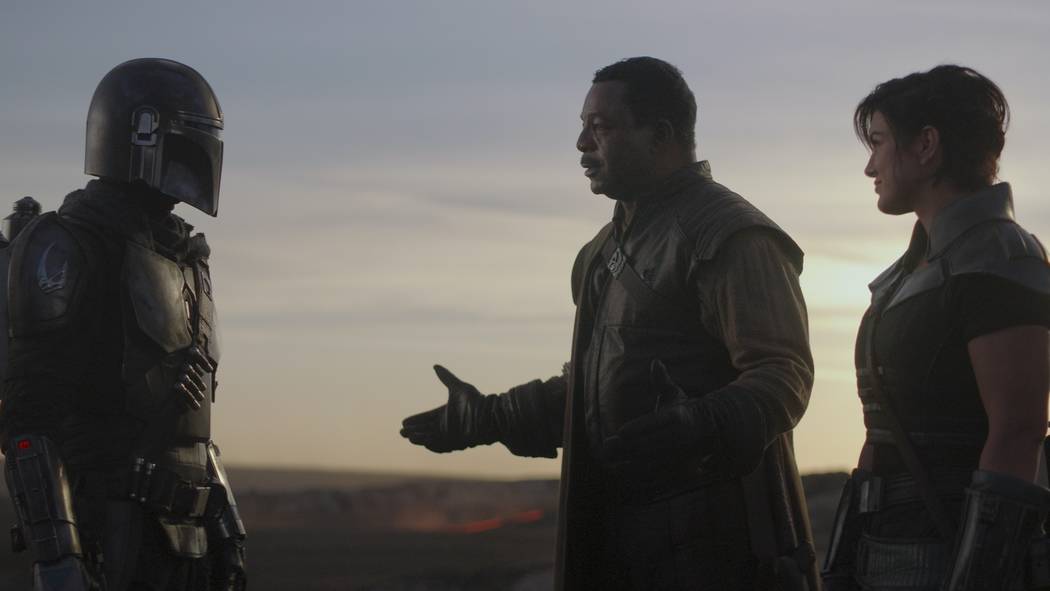 From left, Pedro Pascal, Carl Weathers and Gina Carano appear in a scene from "The Mandalorian. ...
