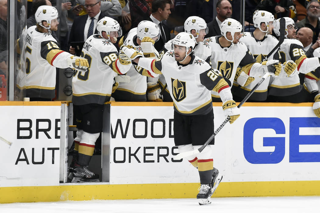 Vegas Golden Knights center Chandler Stephenson (20) is congratulated after scoring against the ...