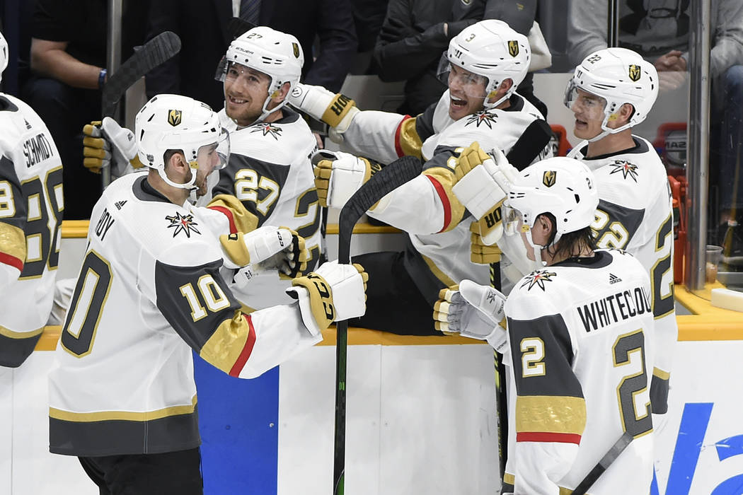 Vegas Golden Knights center Nicolas Roy (10) is congratulated after scoring against the Nashvil ...
