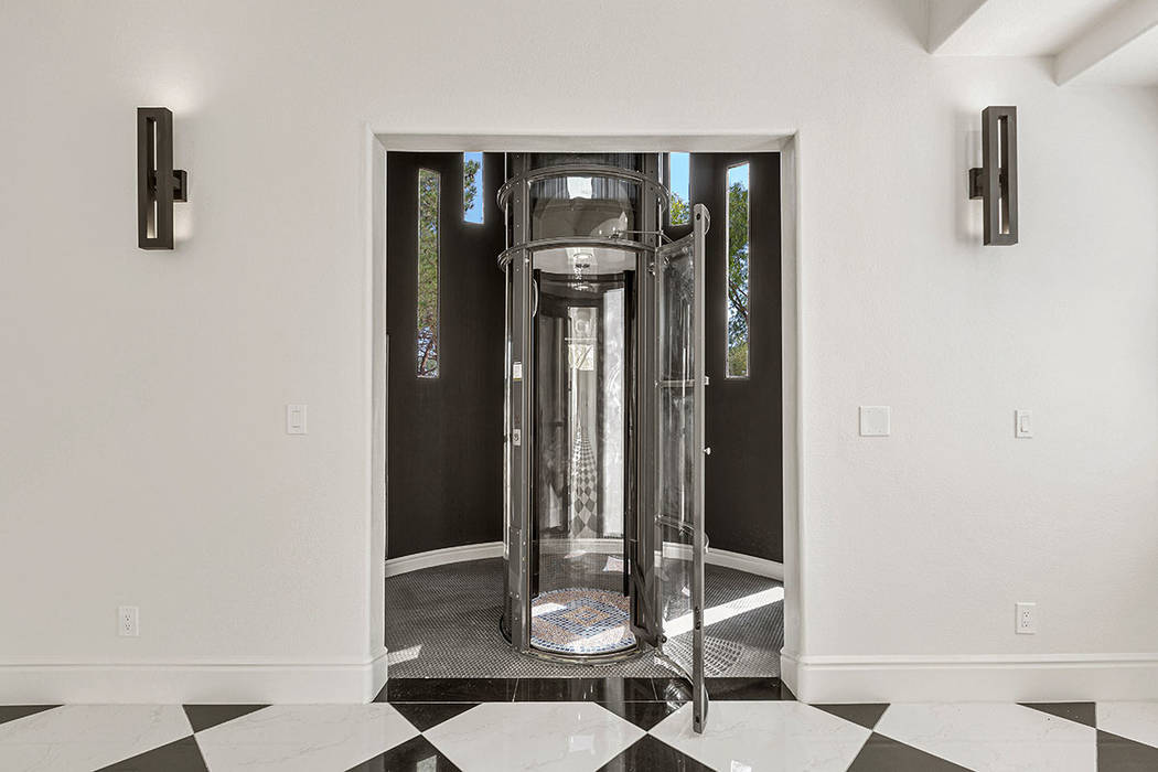 The renovated 8,010-square-foot features a pneumatic elevator. (Red Luxury Real Estate)