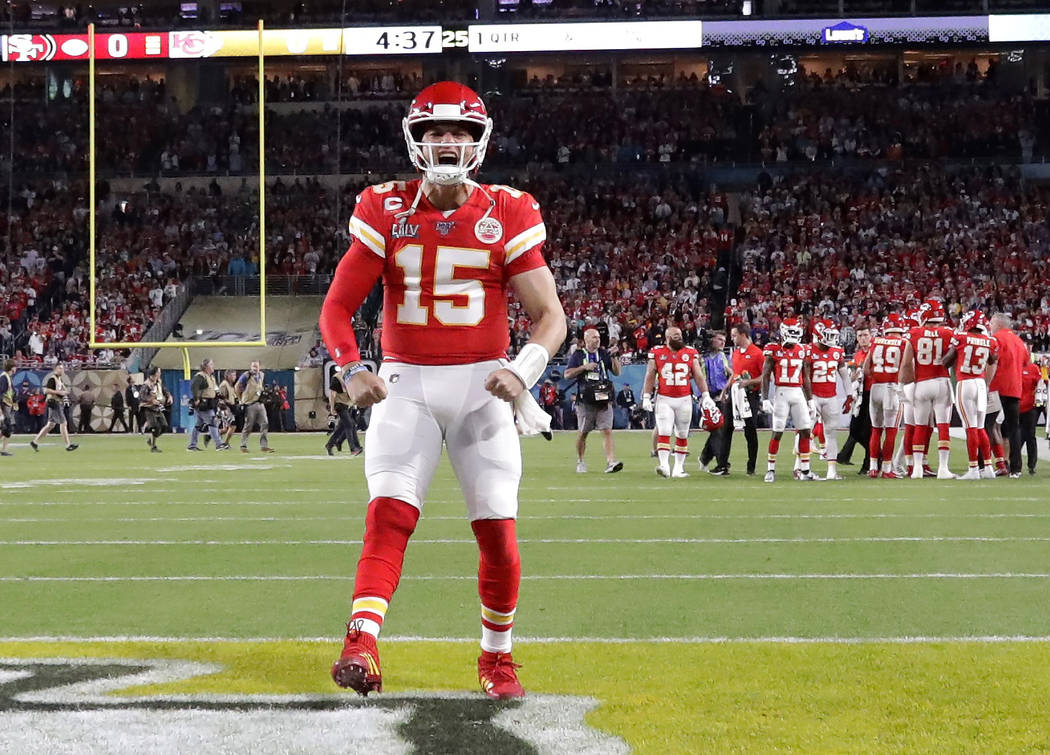 Kansas City Chiefs quarterback Patrick Mahomes (15) gestures before the NFL Super Bowl 54 footb ...