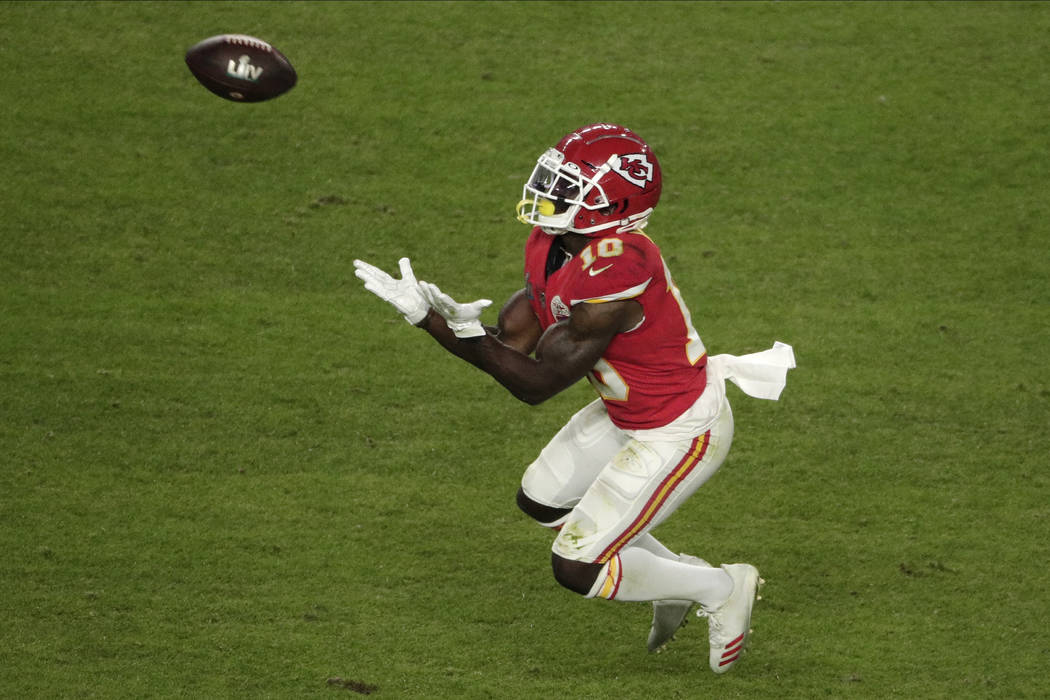 Kansas City Chiefs' Tyreek Hill (10) catches a pass, during the second half of the NFL Super Bo ...